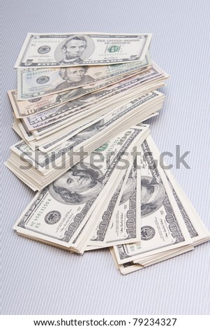 finances. big pile of money over table