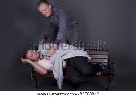 The guy in the suit covers sleeping on a bench guy cloak