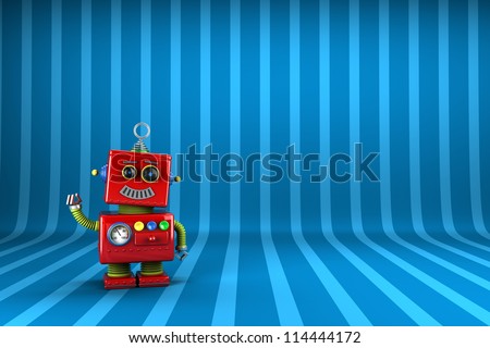 Little happy vintage toy robot waving happily over striped  background