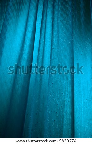 Wet textured surface with blue back lighting