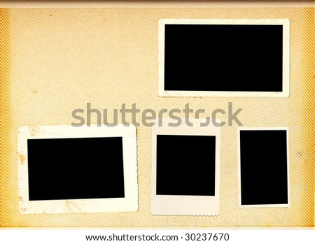 Blank page of a vintage photo album with four photo frames