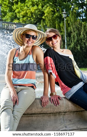 Two  beautiful woman with sunglasses