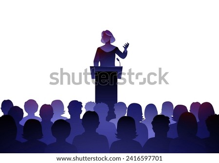 Female Public Speaker On Lectern In Front Of Audience.