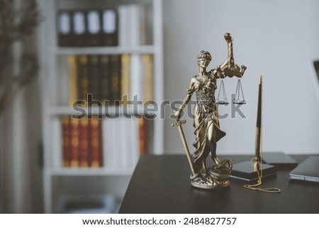 Similar – Image, Stock Photo A statue of Justice, the goddess of justice, with a sword and scales on a pedestal in front of a scenic sunset