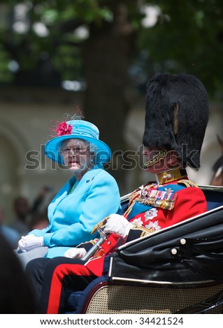 LONDON - JUNE 13: The Queen and The Duke of Edinburgh on The Queen\'s official birthday and is also known as the Birthday Parade, on June 13, 2009 in London, England.