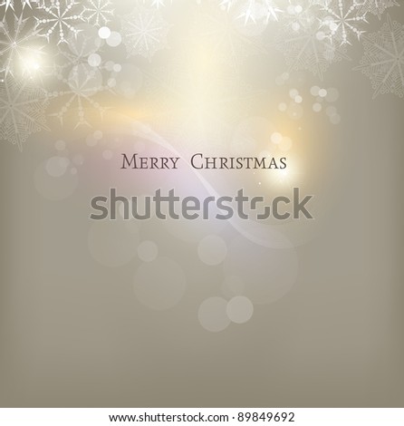 Light gold abstract Christmas background with white snowflakes