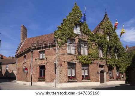 House with vines in Brugge, Belgium