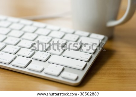 Modern design white keyboard in office environment