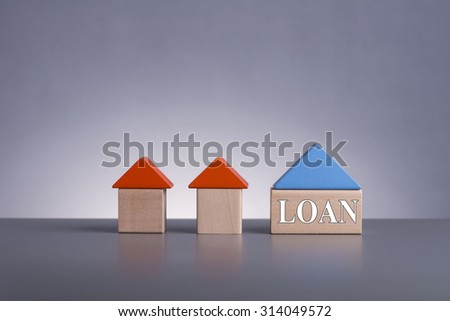 Wooden House (Housing Loan Concept) with word Loan