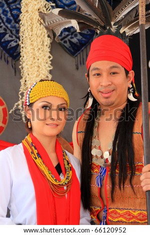 KUALA LUMPUR, MALAYSIA - NOVEMBER 28: The ethnic orang ulu (remote people) of Borneo wearing exotic traditional cloth at the Malaysia Wedding Exhibition on NOVEMBER 28, 2010 in KUALA LUMPUR, MALAYSIA