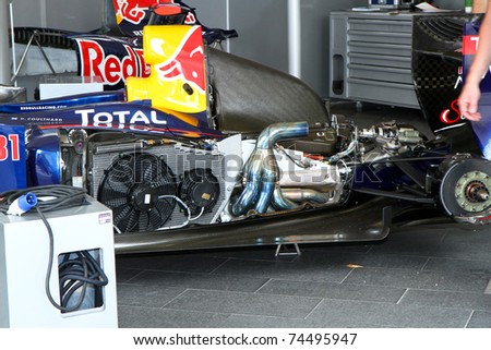 KUALA LUMPUR, MALAYSIA - APRIL 3: Closeup view of the engine from F1 Team Redbul at F1 street demonstration on April 3, 2011 in KL, Malaysia. The team uses Renault engines.