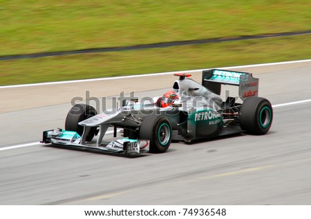 SEPANG, MALAYSIA - APRIL 8: German Michael Schumacher of Mercedes GP at the back straight during Friday practice at Petronas Formula 1 Grand Prix on April 8, 2011 in Sepang, Malaysia