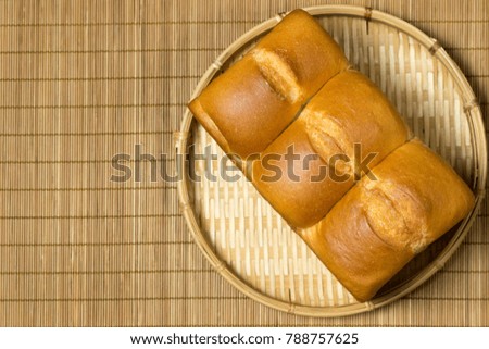 Similar – Foto Bild Drei Sauerteigbrötchen flachgelegt mit Mohn und Sesam auf einer Serviette auf einem Holzhocker