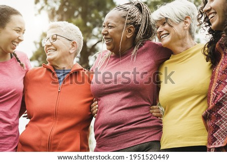 Happy multi generational women having fun together after sport workout outdoor - Focus on center woman face