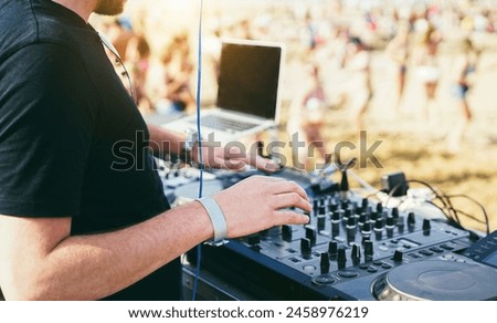 Similar – Image, Stock Photo DJ mixing music during party in club