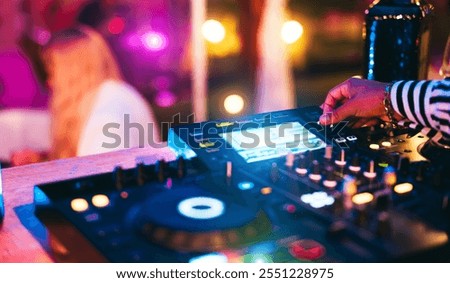 Similar – Image, Stock Photo DJ mixing music during party in club