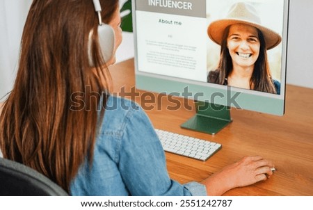 Similar – Image, Stock Photo Senior influencer working at table in modern workplace