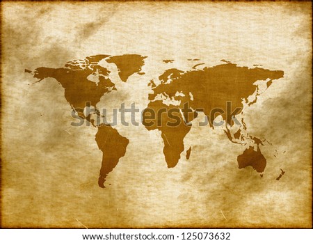 Old retro world map on torn paper