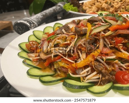 Similar – Image, Stock Photo Beef thai salad served on dish