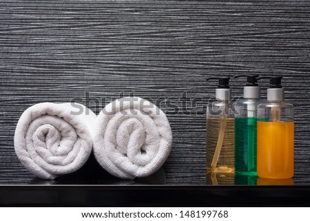 towel rolls and pump bottles.
