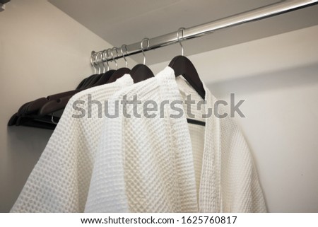 Similar – Image, Stock Photo empty cloakroom Coatrobe