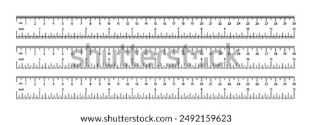 Image Of Three Measuring Rulers Showcasing Both Metric And Imperial Scales. These Rulers Are Aligned Horizontally