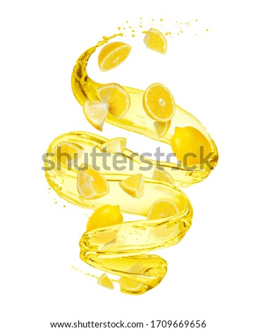 Lemon with splashes of juice in a swirling shape, isolated on white background Foto stock © 