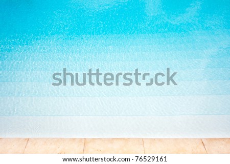 Swimming pool with golden bricks