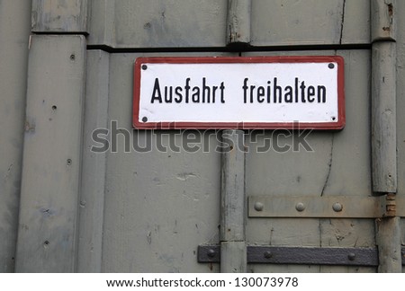 Gate with sign in German language (translation: \