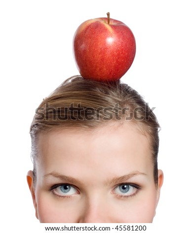 young blonde woman with a red apple on her head