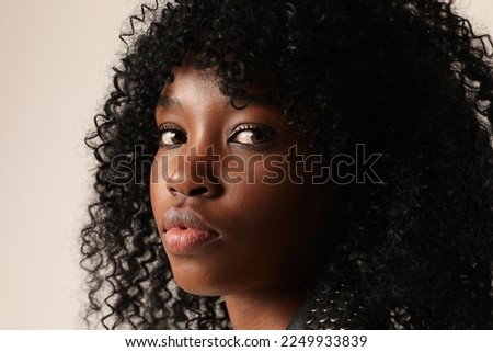 Similar – Image, Stock Photo Close portrait of a young woman standing behind a sliding gate and looking through it