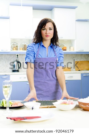 Portrait of pretty Chief cook in the kitchen