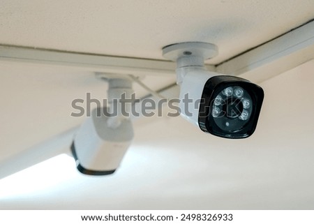 Similar – Image, Stock Photo Security camera on the building facade