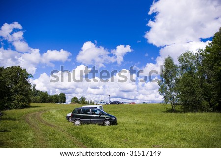 park with auto on the grass