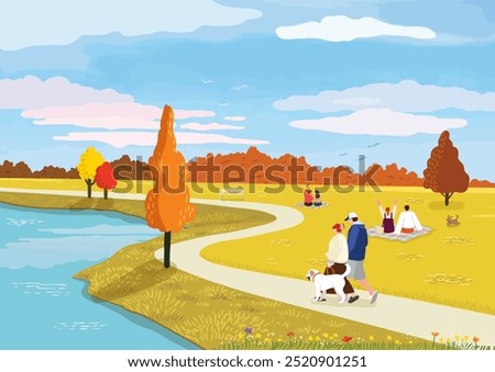 People enjoying a leisurely walk and relaxation by the lake colored in autumn leaves