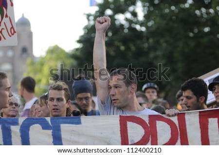 TORONTO-JUNE 28:  Protesters chanting slogans during a protest rally to denounce the mass arrest of the police after the G20 summit on June 28, 2010 in Toronto, Canada.