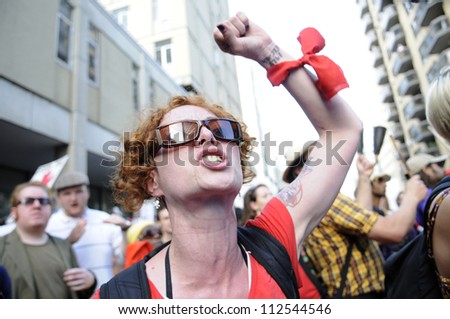 TORONTO-JUNE 25: An angry protester chanting slogans   during the G20 Protest on June 25  2010 in Toronto, Canada.