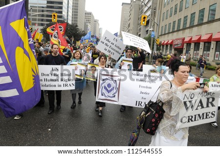 TORONTO-JUNE 26:Anti -Israel activists protesting against war crime  during the G20 Protest on June 26 2010 in Toronto, Canada.