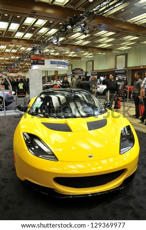 TORONTO-FEBRUARY 22: A yellow lotus Elise on display during the 40th International Auto Show on February 22, 2013 in Toronto, Canada.