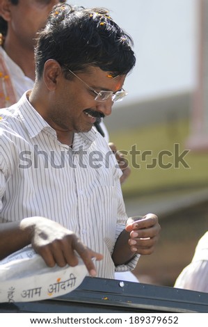 AMETHI - APRIL 20:  Arvind Kejriwal sharing a smile in between a hectic  road show in support of Amethi candidate Dr. Kumar Viswas on April 20, 2014 in Amethi ,India.