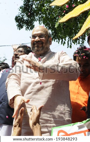 NEW DELHI-MAY 16:  Amit Shah the general secretary of the BJP party being congratulated by supporters  after BJP won the Indian National election on May 16, 2014 in New Delhi , India.