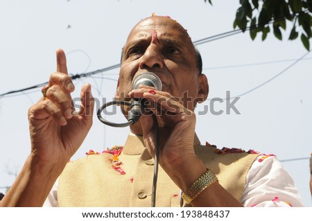 NEW DELHI-MAY 16:  BJP party president Rajnath Singh addressing supporters after his party won the Indian National election on May 16, 2014 in New Delhi , India.