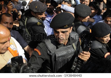 NEW DELHI-MAY 16:  BJP party president  Rajnath Singh walking out of an auditorium after a press conference after his party won the Indian National election on May 17, 2014 in New Delhi , India.