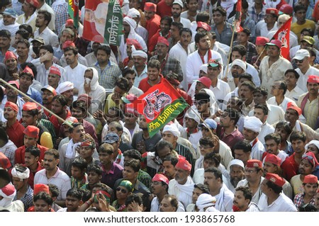 VARANASI-MAY 10:  A Samajwadi Party flag flies high during an election rally of  UP Chief Minister Akhilesh Yadav  on May 10, 2014 in Varanasi , India.
