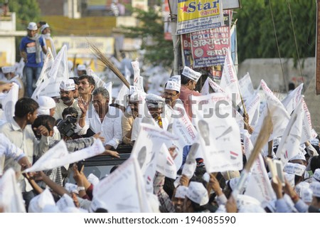 VARANASI - MAY  9: AAP leaders surrounded by their supporters  during a political rally on May  9, 2014 in Varanasi , India.