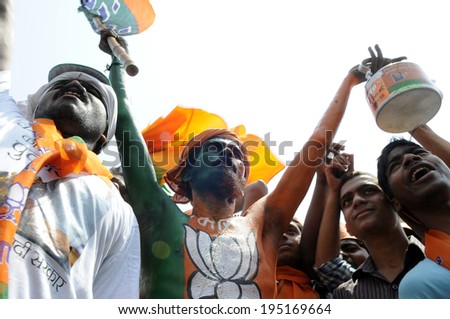 VARANASI - MAY 8:  BJP supporters chanting slogans during a political rally on May 8, 2014 in Varanasi , India.