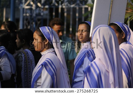 KOLKATA - MARCH 16 : Christian nuns participating in a candle light vigil to protest gang rape of an elderly nun on March 16, 2015, at Allen Park in Kolkata, India.