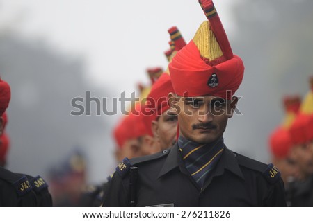 KOLKATA -JANUARY 19 : A soldier of the Jat Regiment - an infantry regiment of the Indian Army  sharing a look  during the Republic Day Parade preparation on January 19, 2015 in Kolkata, India.