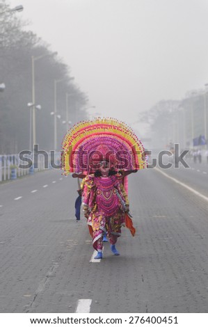 KOLKATA - JANUARY 19 : Chhau dancers wearing masks marching during the Republic Day Parade preparation on January 19, 2015 in Kolkata, India.