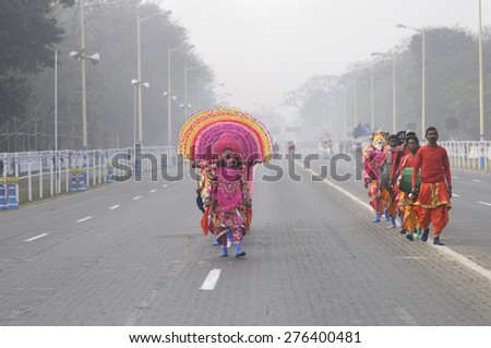 KOLKATA - JANUARY 19 : Chhau dancers wearing masks marching during the Republic Day Parade preparation on January 19, 2015 in Kolkata, India.